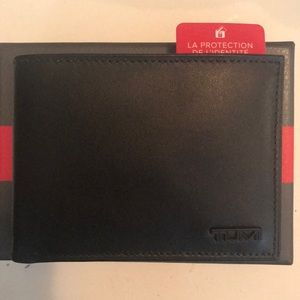 TUMI wallet- Brand New!